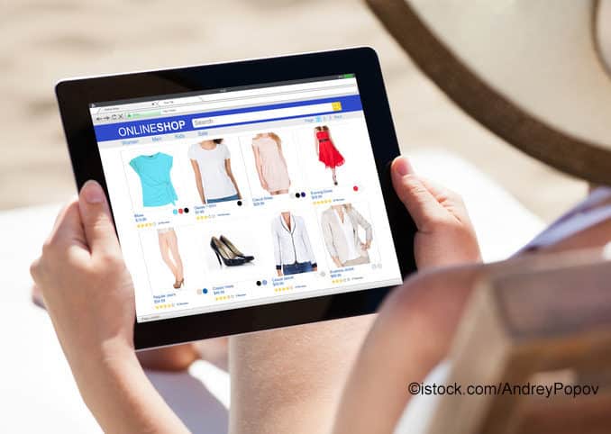 Online Shop Mitarbeiter mit Tablett Online Shop Mitarbeiter mit Tablett